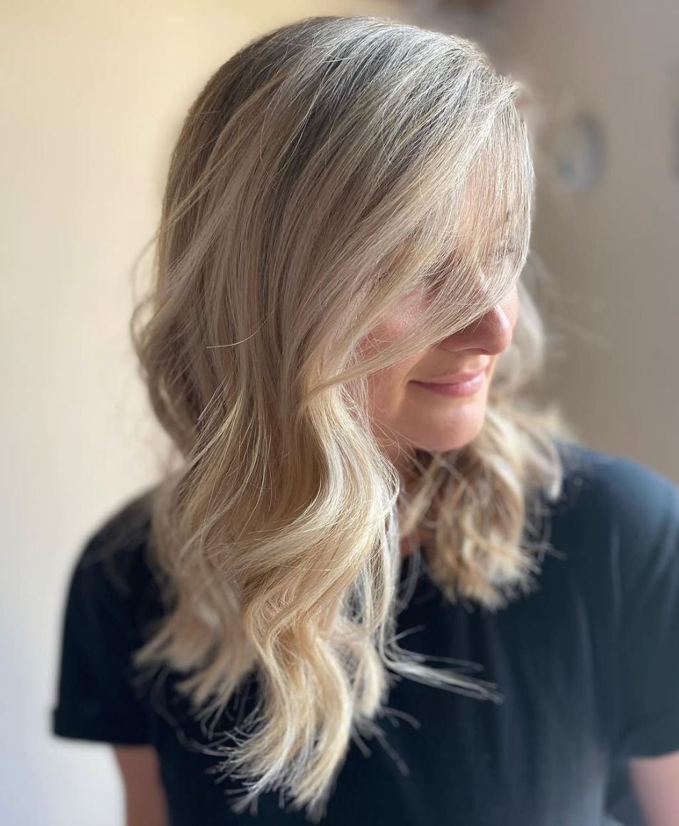 Icy blonde blow wave with soft curls